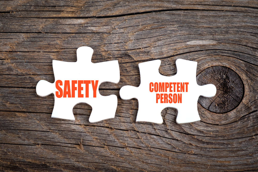 Competent person health and safety puzzle pieces