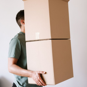 Health and Safety courses man carrying boxes manual handling course